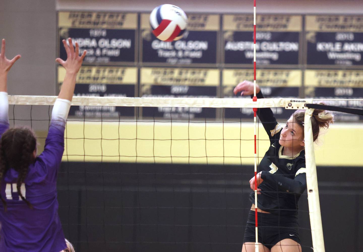 Sycamore's Laci Neece spikes the ball during their match against Rochelle Tuesday, Sept. 13, 2022, at Sycamore High School.