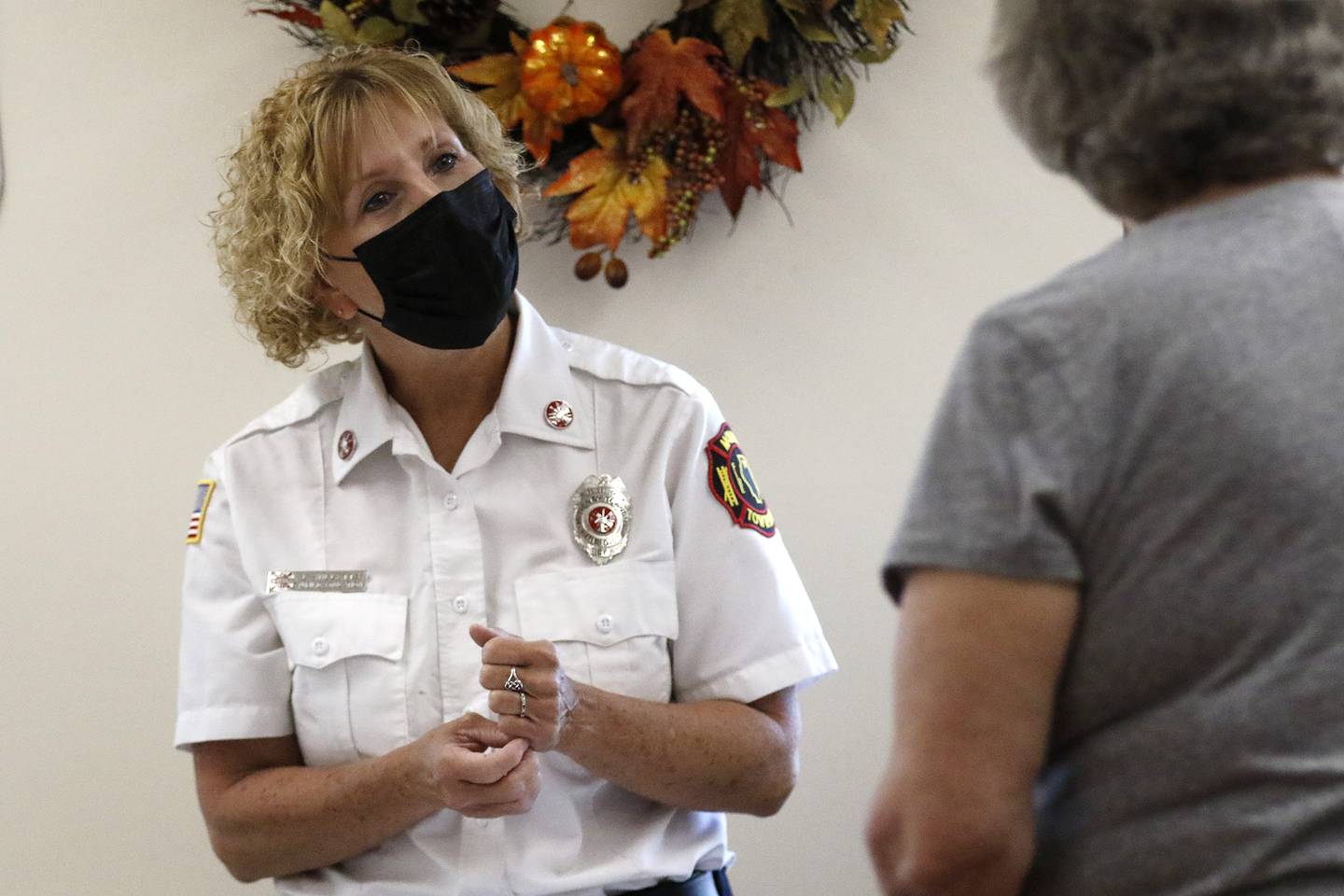 McHenry Township Fire Protection District Public Education Coordinator Linda Willetts talks with Barbara Veckey, of Volo, during the Meet a Hero Be a Hero blood drive with AmeriCorps Seniors, Senior Service Associates, and Versiti at McHenry Senior Center on Thursday, Sept. 9, 2021 in McHenry.  The blood drive booked all 24 appointments and offered donors a chance to meet some first responders from the Johnsburg Police Department and McHenry Township Fire Protection District as a rememberance on the 20th anniversary of the terrorism attacks on Sept. 11, 2001.