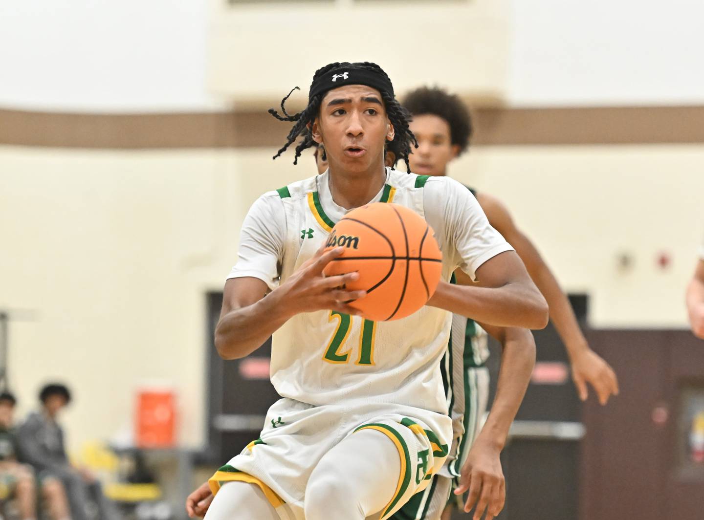 Providence Catholic's Jayde Wyett (21) looks to pass the ball during the WJOL tournament game against Plainfield Central on Friday, NOV. 28, 2025, at Joliet.