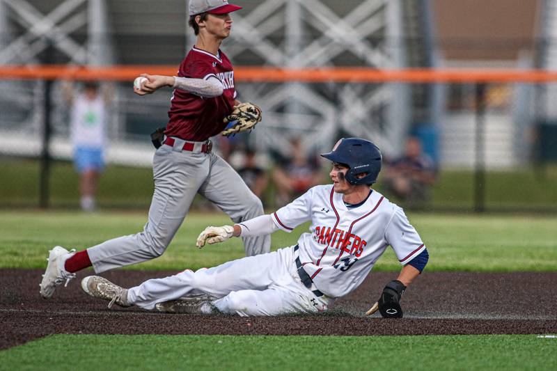 Oswego's Luke Voelker (19) slides into second during Class 4A Romeoville Sectional semifinal game between Plainfield North at Oswego.  June 1, 2023.