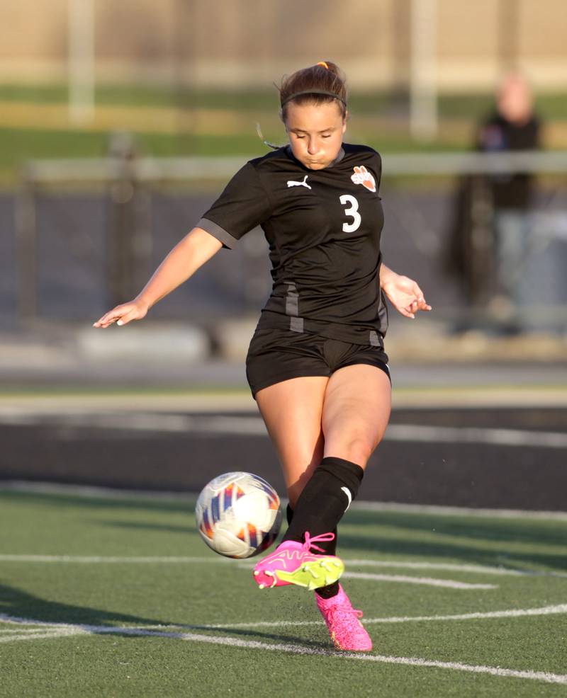 Wheaton Warrenville South’s Brooke Ittersagen kicks the ball during a game against St. Charles East in Wheaton on Tuesday, April 18, 2023.