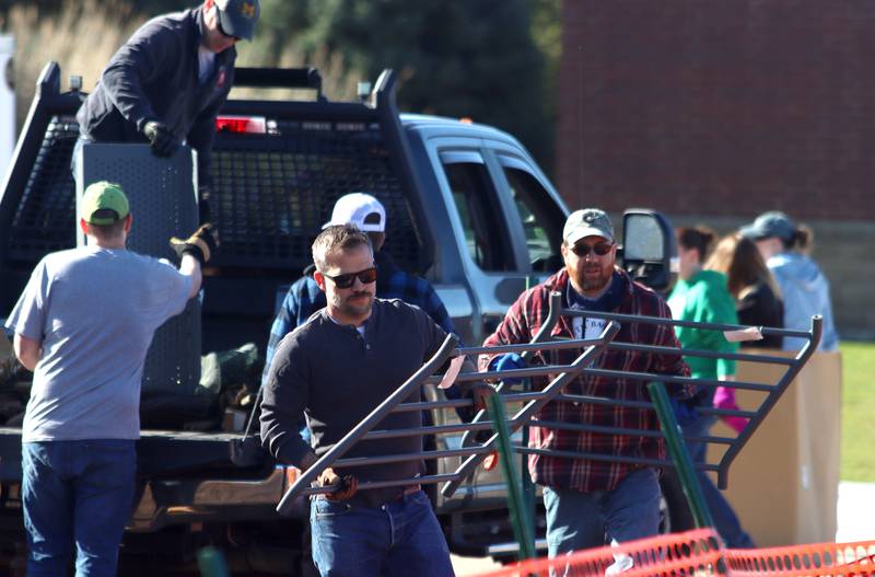 Volunteers and friends of Three Oaks Elementary School constructed a new playground at the Cary school on Saturday.