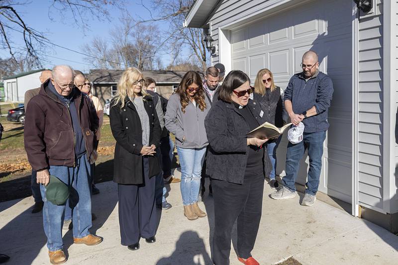 First Presbyterian pastor Nikelle Johnson blesses the latest Dixon Habitat for Humanity house Sunday, Nov. 23, 2025. This is the 33rd home the organization has built.