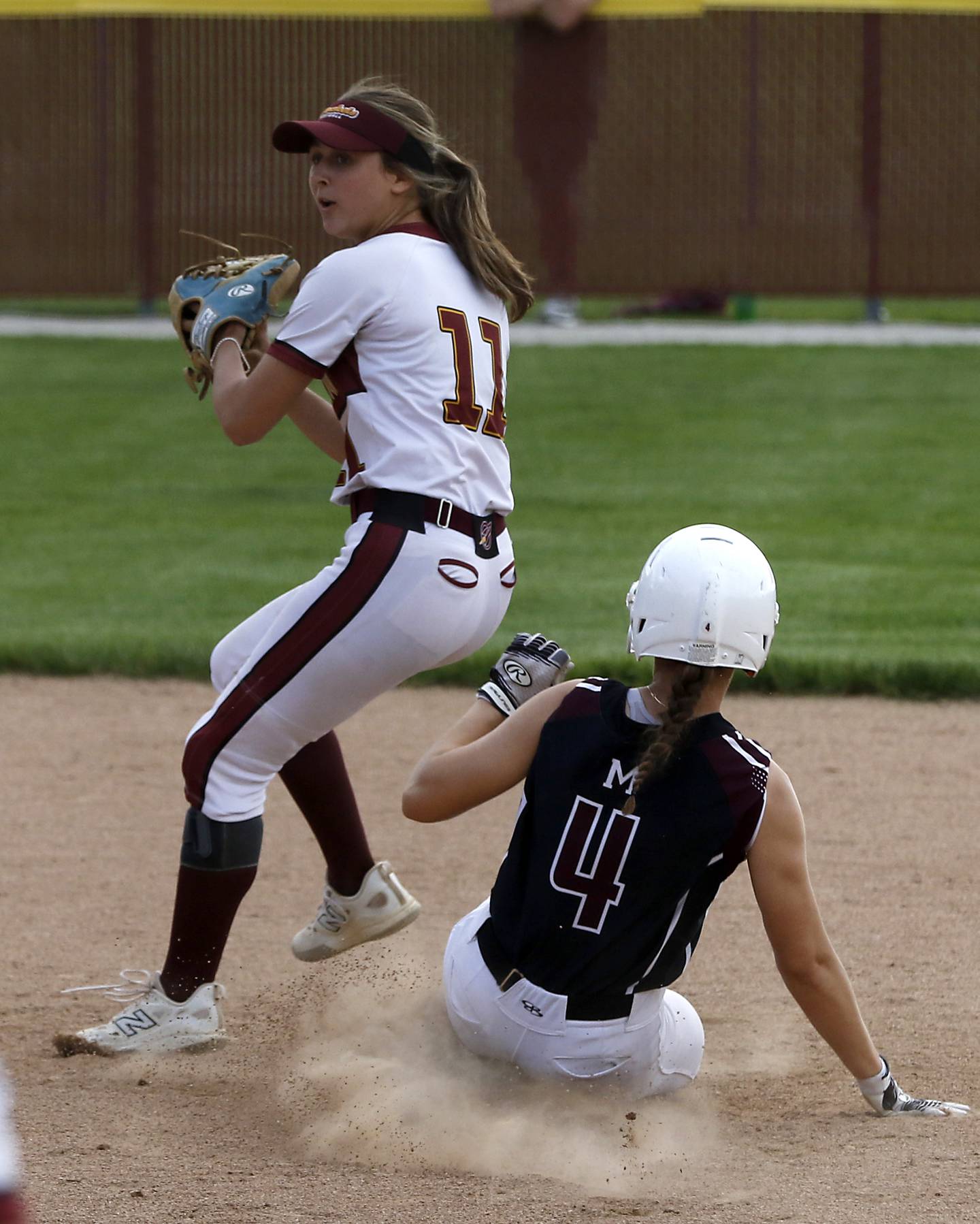 Richmond-Burton's Gracie Johnson holds the ball as forcing out Marengo's Joszsa Christiansen out a second base during a Kishwaukee River Conference softball game on Monday, May 12, 2025, at Richmond-Burton High School in Richmond.