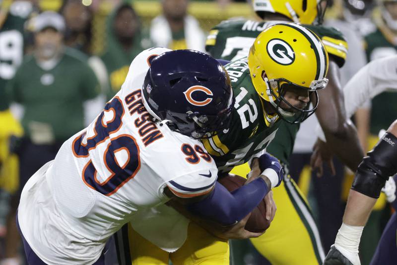 Chicago Bears pass rusher Trevis Gipson sacks Green Bay Packers quarterback Aaron Rodgersduring the first half, Sunday, Sept. 18, 2022, in Green Bay, Wis.
