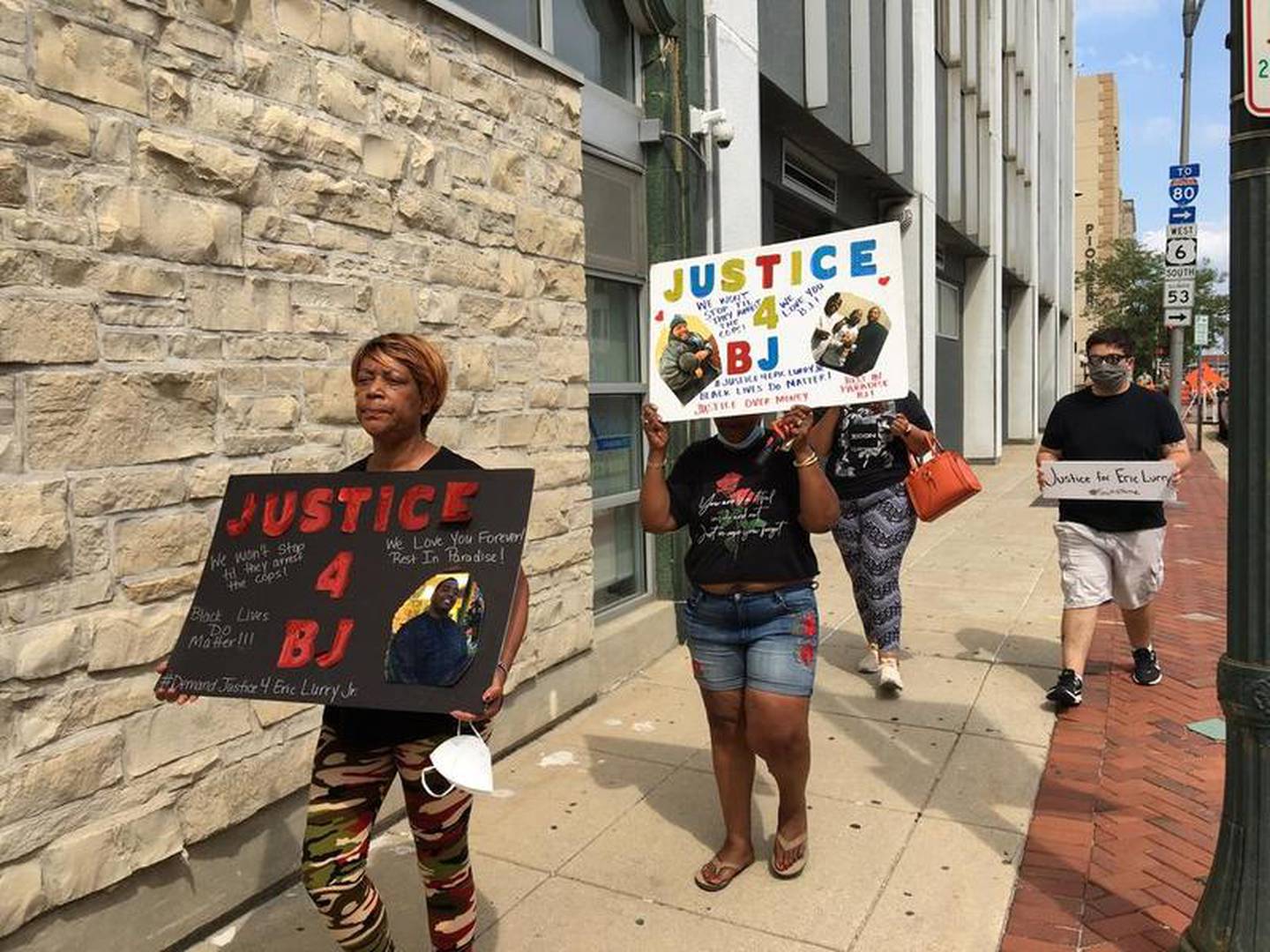 Protesters hold rally against Will County State's Attorney James Glasgow in response to the death of Eric Lurry on Monday, Aug. 10, 2020, in downtown Joliet.