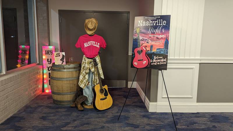 A Nashville-themed display greets attendees at the entrance of the Shorewood HUGS annual chocolate ball fundraiser on Saturday, Feb. 3, 2024, at the Posh Banquets & Event Center in Joliet. The fundraiser's theme this year was "Nashville Nights."