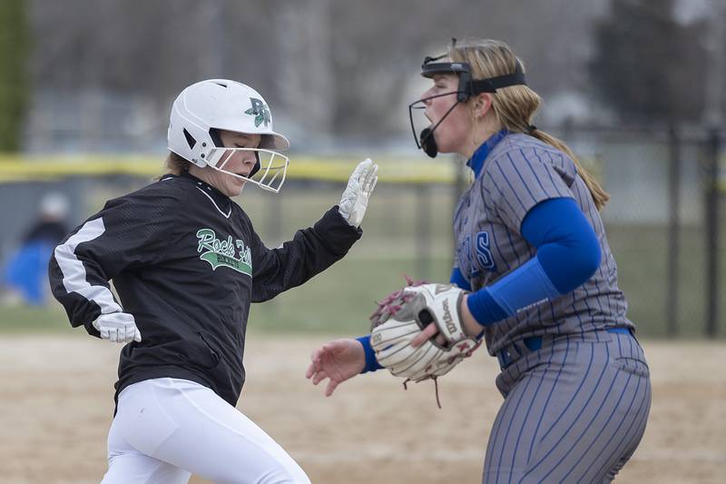 Rock Falls’ Kacie Witherow rounds third base to score against Princeton Thursday, March 27, 2025.