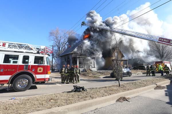 Photos: La Salle firefighters battle two-story house fire on Bucklin Street