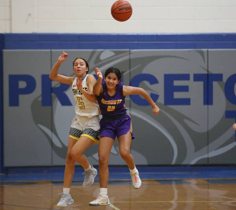 Putnam County's Eme Bouxsein and Mendota's Crystal Garcia sprint to a loose ball during the Princeton High School Lady Tigers Holiday Tournament on Tuesday, Nov. 14, 2023 in Prouty Gym.
