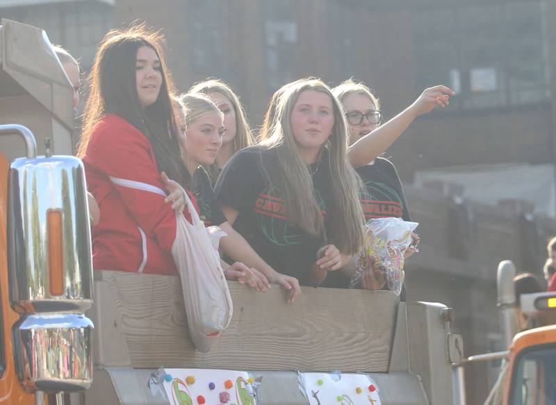 The L-P volleyball team rides on a float during the homecoming game on Thuesday, Oct. 2, 2025 downtown Peru.