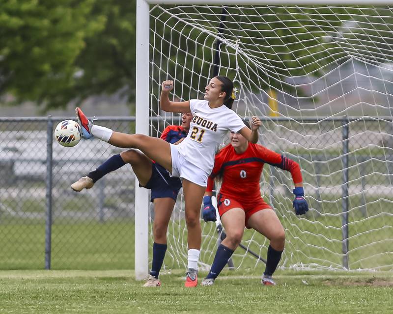 Neuqua Valley's Miabella Kraai (21) kicks at the ball in front of Oswego's goal during Class 3A regional final soccer match between Neuqua Valley at Oswego on Saturday, May 23, 2026 in Oswego.