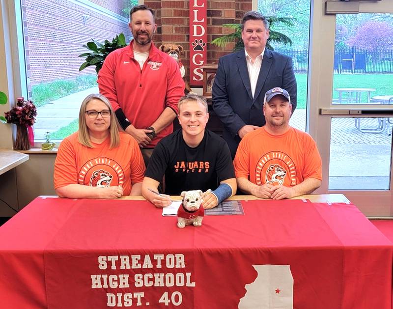 Recent Streator graduate and Times All-Area Boys Soccer first-teamer David Paton has signed on to continue his education at Governors State University in University Park and his soccer career at the NAIA level with the Jaguars. Pictured here at his signing are (left to right): in front – Cori Paton, David Paton and Jason Paton; and in back – Streator coach J.T. Huey and Governors State coach Matt Eggert.