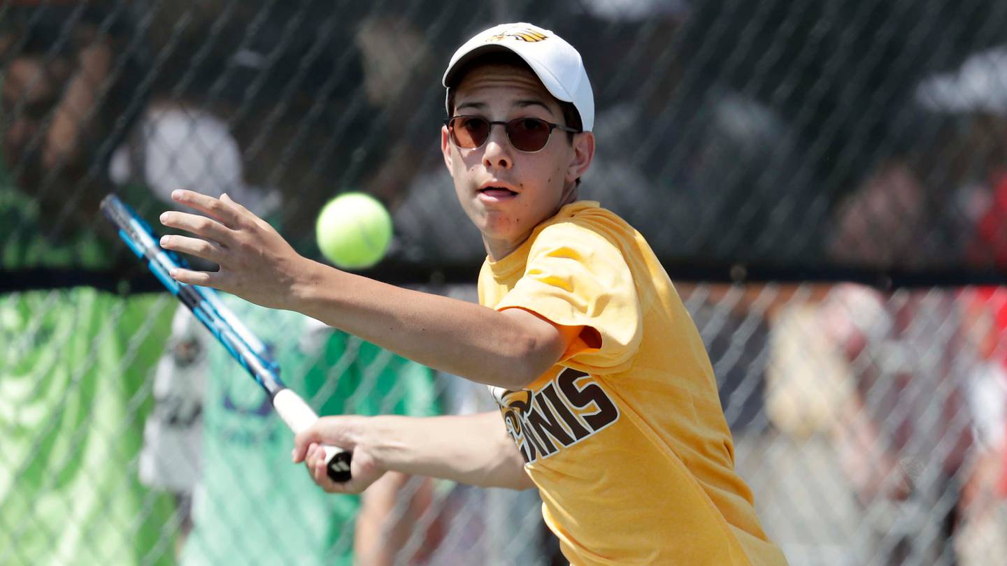 Jacobs' Kyle McNally competes during the Class 2A boys tennis state finals June 12, 2021 at Hersey High School in Arlington Heights.