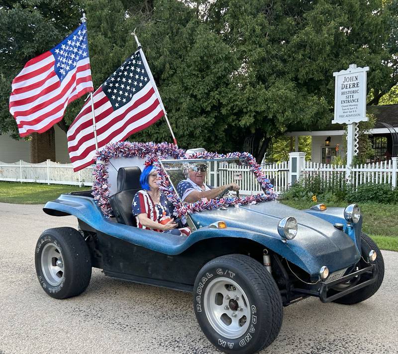 Sandi Wadsworth (seated) was the honorary parade marshal for the 7th Annual Grand Detour Golf Cart Parade on Sunday, July 6.