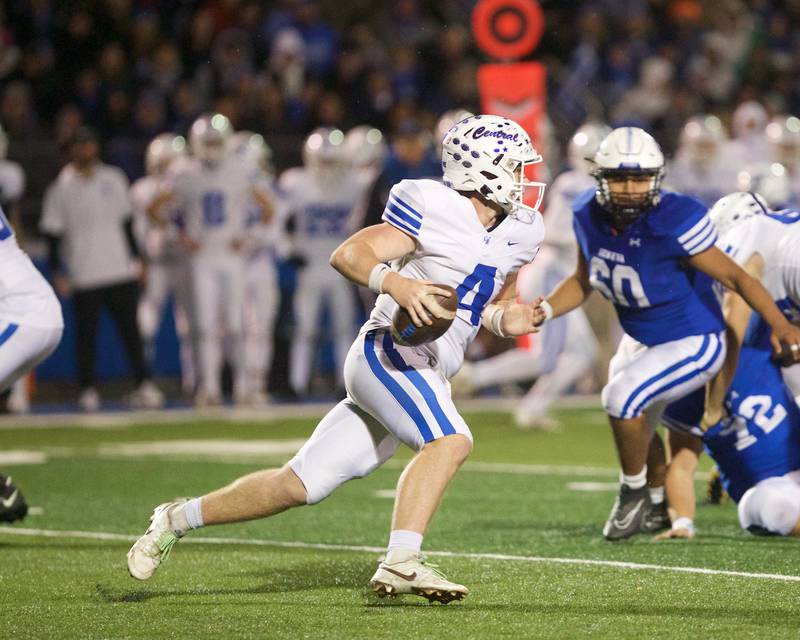 Burlington Central's Jackson Alcorn runs the ball for a gain against Geneva at the Class 6A second-round playoff game on Saturday Nov.9,2024 in Geneva.