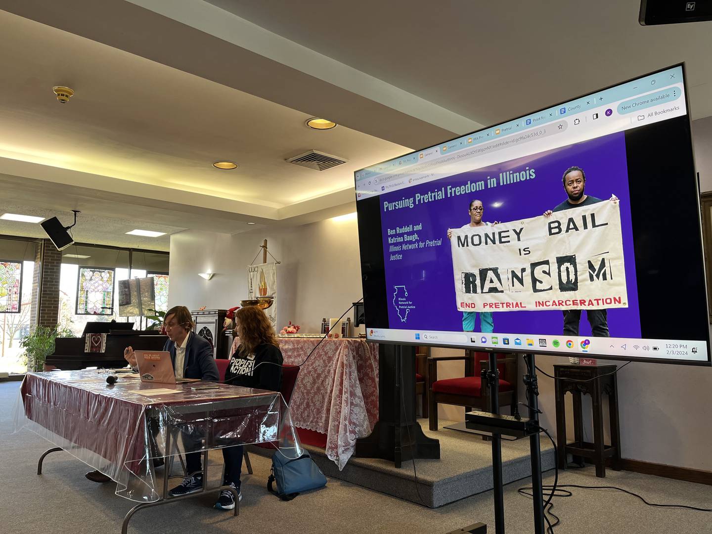 Ben Ruddell, director of criminal justice policy for ACLU of Illinois (left), and Katrina Baugh, west suburban organizer for The People’s Lobby, deliver a presentation on the elimination of cash bail on Saturday, Feb. 3, at Universalist Unitarian Church of Joliet.