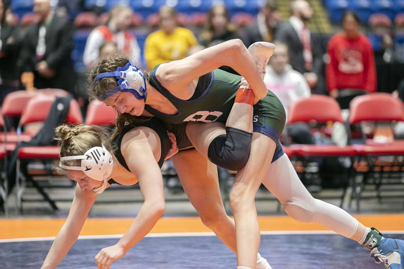 Emma Engels of Bartlett controls Alexandra Sebek in the 100 pound championship match at the IHSA girls state wrestling championships Saturday, Feb. 25, 2023. Engels took the win.