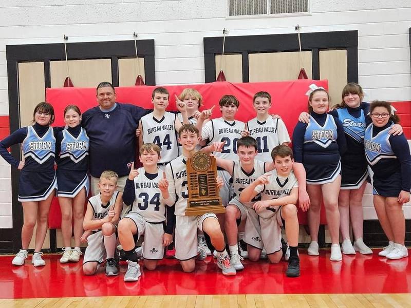 The Bureau Valley Storm, the top seed, captured the SRC 7th-grade championship, defeating No. 2 Ottawa 35-13 Thursday at Mendota. It's the first boys title for BV since joining the BVEC in 2019-20. Team members and cheerleaders are (front row, from left to right) Bentley Chamberlain, Levi Slock, Carson Gruber, Waylon Miller and Owen Cady; and (back row) Lily Fritz, Lydia Gross, Coach Jim Nugent, Charles Taylor, Chase Stier, Wyatt Smith, Brady Smith, Addelle Burden, Myleigh Benavidez and Ariana Comer.
