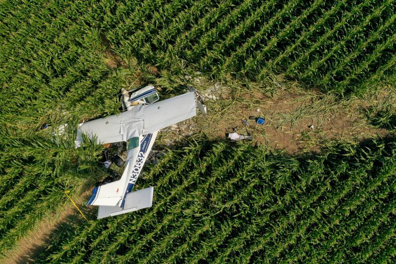A plane rests in a corn field after crashing near the DeKalb Taylor Municipal Airport in Cortland on Thursday, July 27, 2023.