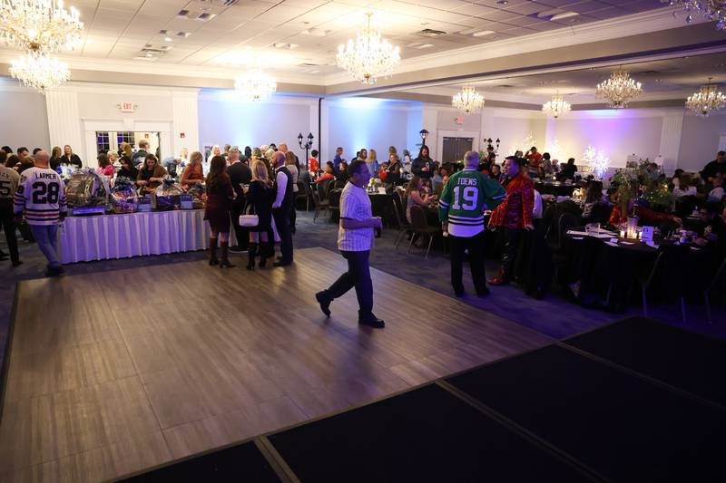 Hundreds attended the Shorewood HUGS "Sweet Home Chicago" chocolate ball fundraiser in Joliet on Saturday, February 4, 2023. The event helped raise money for the nonprofit's Hugs and Wishes program.