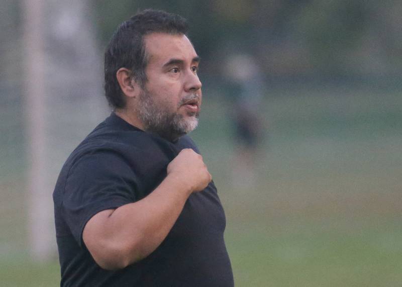 St. Bede soccer coach David Garcia watches his team play against Abingdon-Avon on Wednesday, Oct. 15, 2025 at St. Bede Academy.