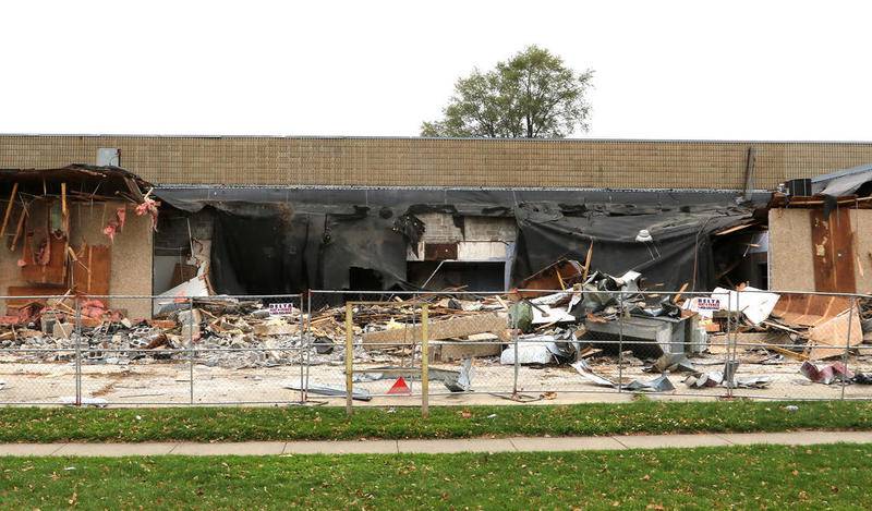 The Campus Cinemas building on Blackhawk Road in DeKalb is partially torn down Tuesday afternoon.