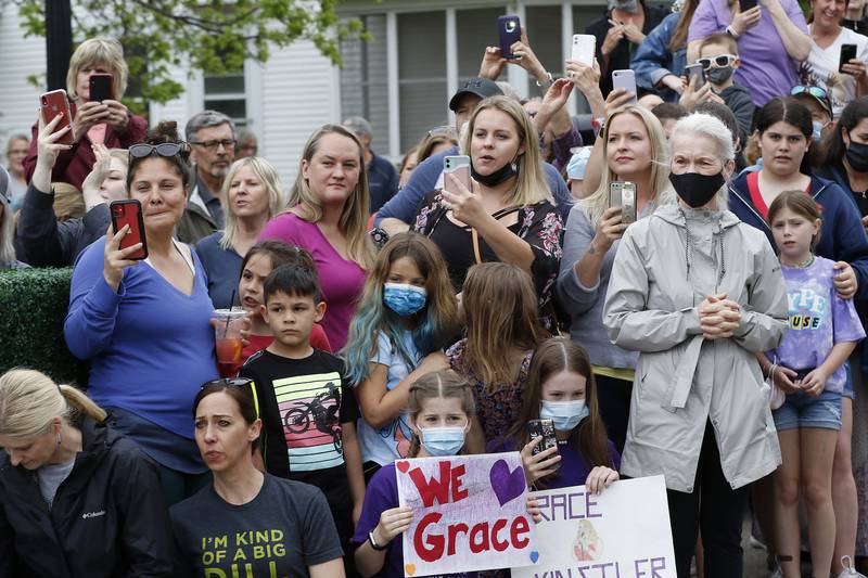 Fans wait for Grace Kinstler, a Crystal Lake Central High School graduate and finalist on "American Idol," during a parade through downtown on Tuesday, May 18, 2021, in Crystal Lake.