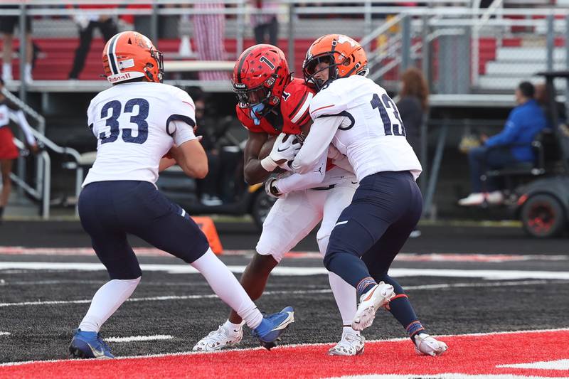 Bolingbrook’s Kyan Berry-Johnson peddles his way in for the score against Naperville North on Friday, Sept. 8, 2023 in Bolingbrook.