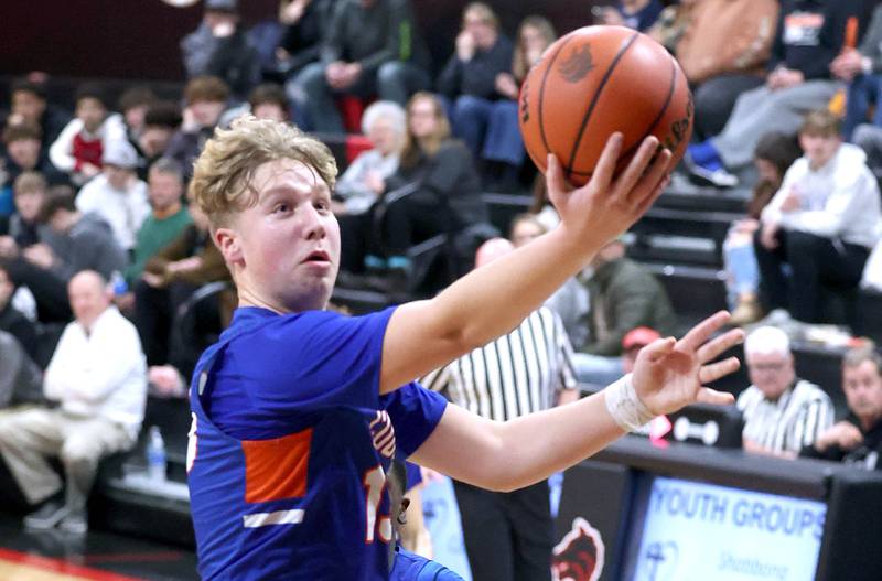 Genoa-Kingston's Hayden Hodgson shoots a layup Wednesday, Jan. 25, 2023, during their game at Indian Creek High School in Shabbona.