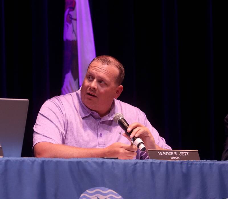 Mayor Wayne Jett speaks as the McHenry City Council on Monday, Aug. 7, 2023, addressed a Jack Pease proposal to mine 110 acres at Route 120 and Chapel Hill Road. The meeting was held in McHenry High School’s Upper Campus auditorium.