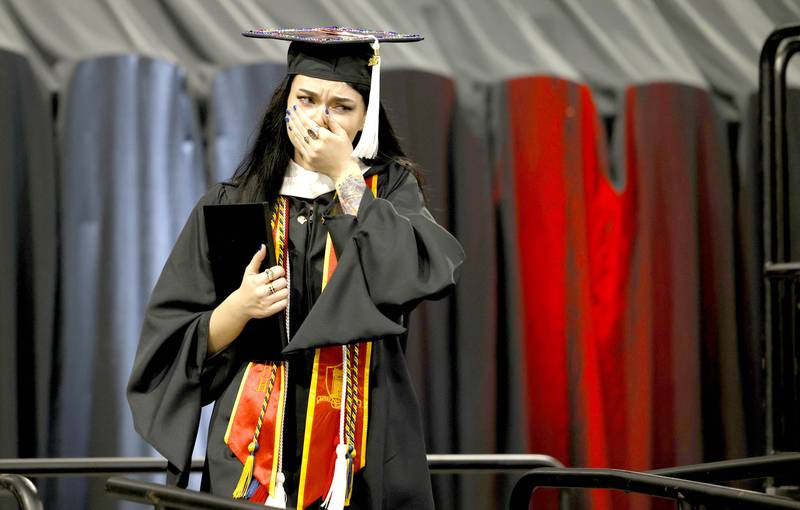 Northern Illinois University graduate students collected their diplomas during the Class of 2023 Commencement May 12, 2023 at the NIU Convocation Center in DeKalb.