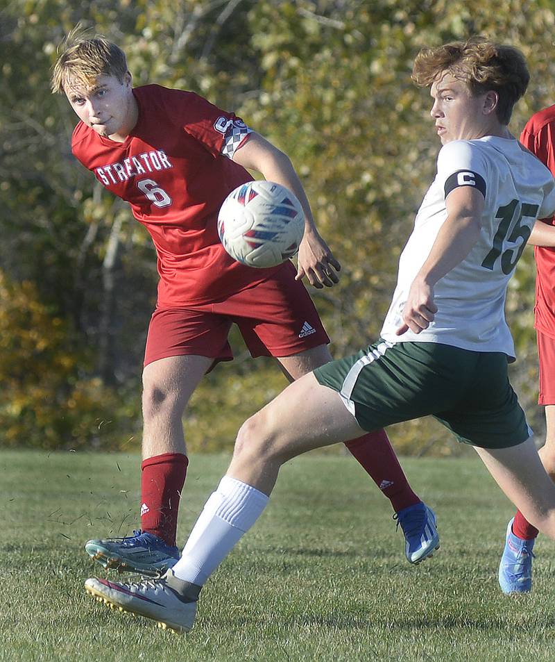 Streator’s Noah Russow gets to the ball ahead of Coal City’s Sam Sterba in the first half of Tuesday's Illinois Central Eight Conference match at the James Street Recreation Center in Streator.