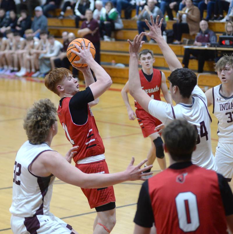 Forreston's Connor Politsch (11) shoots during a Tuesday, Dec. 17, 2024 game against Dakota at the 63rd Annual Forreston Holiday Tournament.