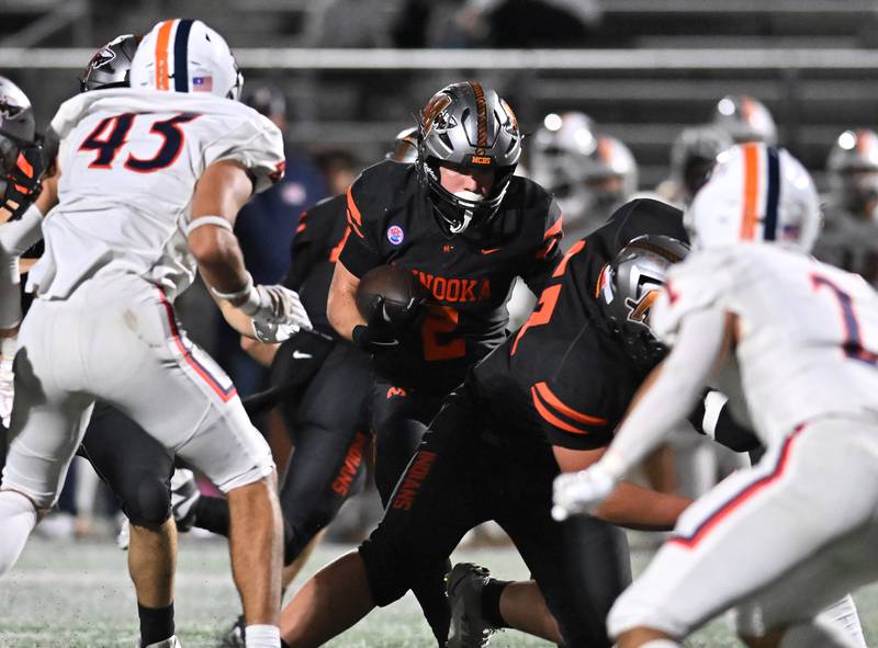 Minooka's Chase Nurczyk (2) running the ball during the conference game against Oswego on Friday, OCT. 10, 2025, at Minooka.