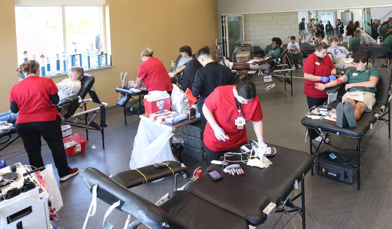 Students give blood during the Saint Bede Community Blood Drive on Tuesday, Nov. 4 in the Perino Science Center at St. Bede Academy. The goal was to collect 100 pints this school year. If the school reaches it's goal, the Red Cross will award a $1,000 scholarship to one graduating senior.