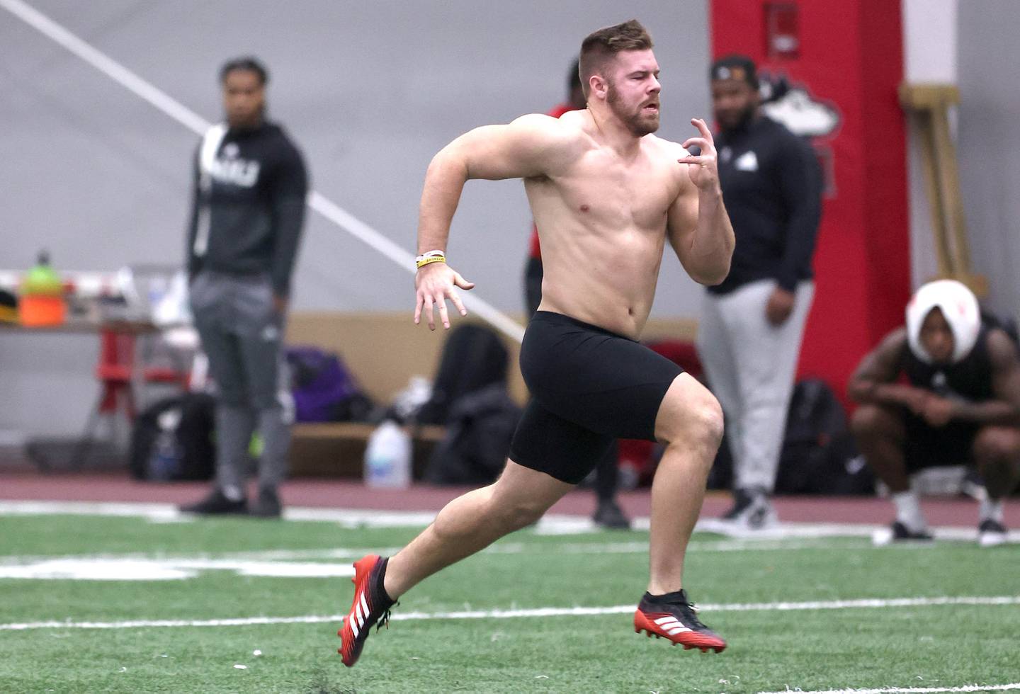 Former Northern Illinois University running back Clint Ratkovich runs the 40-yard dash Wednesday, March 30, 2022, during pro day in the Chessick Practice Center at NIU. Several NFL teams had scouts on hand to evaluate the players ahead of the upcoming draft.