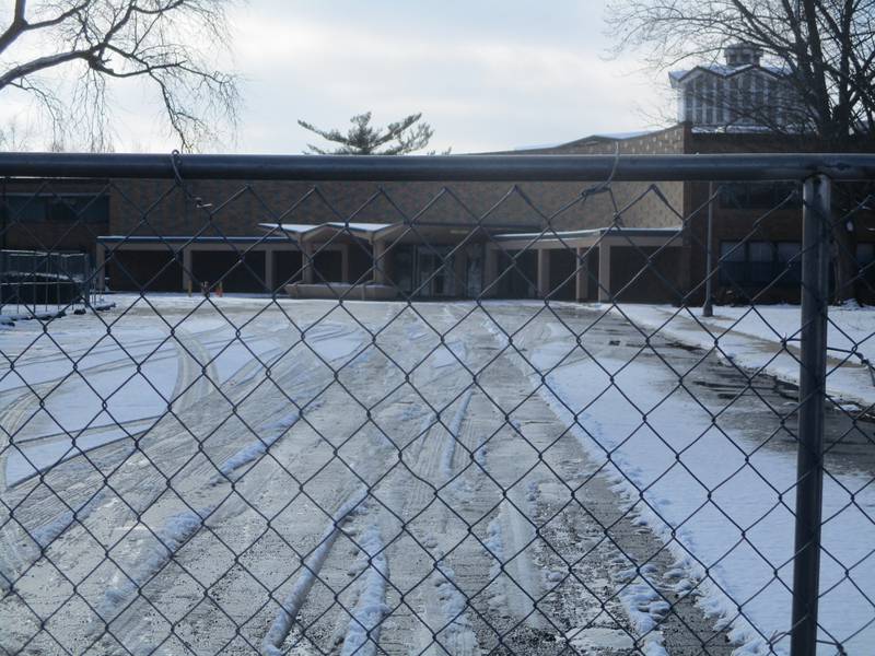Fence has been erected around the former Our Lady of Angel Retirement Home in Joliet in preparation for demolition of the building. Jan. 10, 2024
