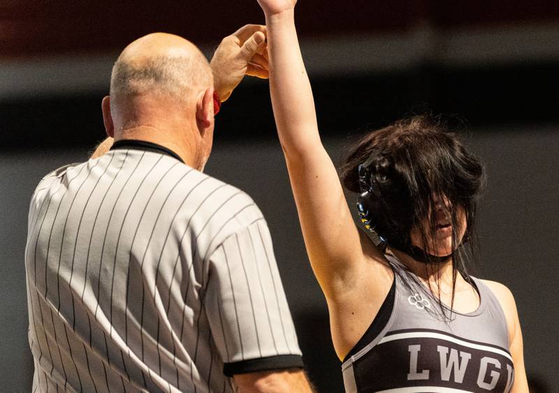 Lincoln Way’s Avery Holeman faces the crowd after winning a match against Batavia’s Caoihme Mitchell during a varsity wrestling dual at Batavia High School on Friday, Jan. 10, 2025. Holeman won the match.