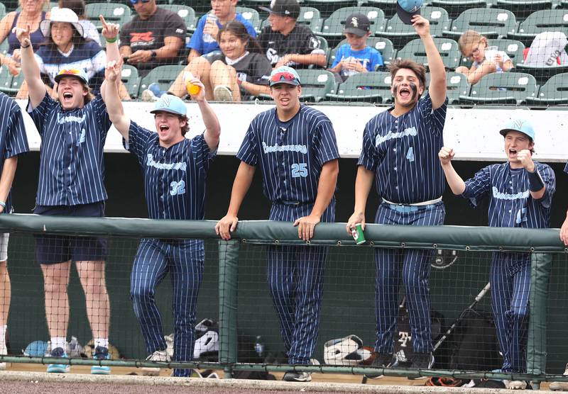 The Nazareth bench starts to celebrate late in their 16-3 win over Crystal Lake South Friday, June 10, 2022, in the IHSA Class 3A state semifinal game at Duly Health and Care Field in Joliet.