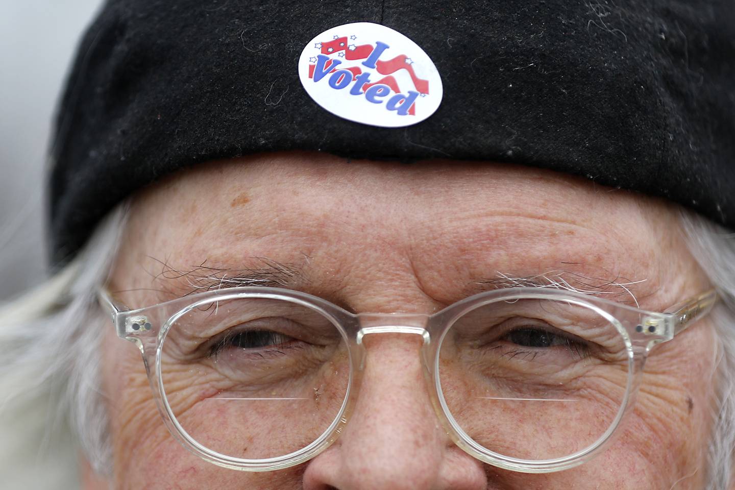 Dave Trost of McHenry wears a “! Voted” sticker on his hat Friday, March 31, 2023, after voting in the 2023 Consolidated Election at he McHenry City Hall. Election Day is April 4.