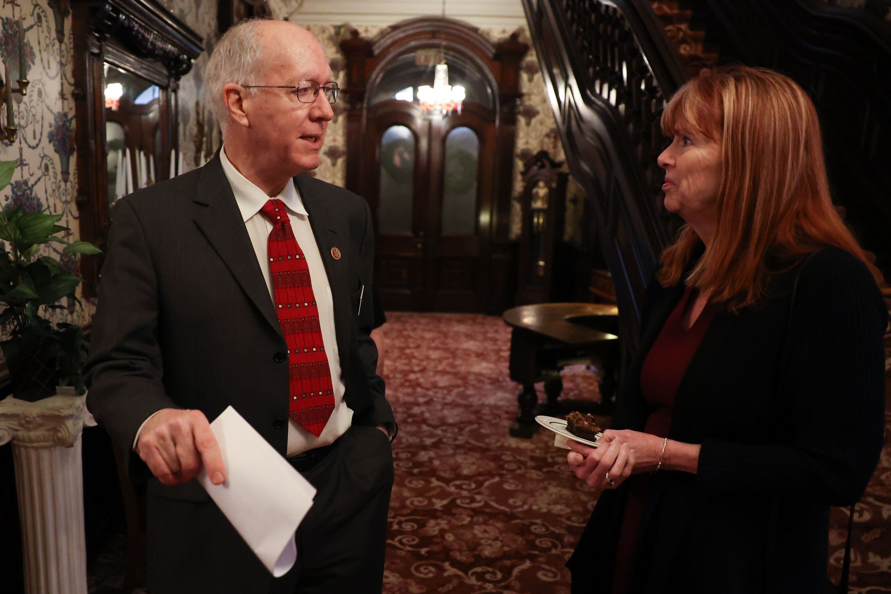 Congressman Bill Foster (D-Ill) talks with Dr. Kathy Burke, of the Will County Health Department, at a United Way private event where he presented a check for $884k for their Resilient Youth mental wellness program at the Jacob Henry Mansion on Thursday, February 23rd, 2023 in Joliet.