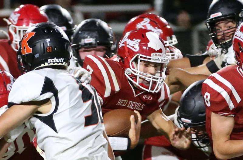Hall quarterback Dylan Glynn runs the ball on a carry against Kewanee on Friday, Sept. 27, 2024 at Richard Nesti Stadium.