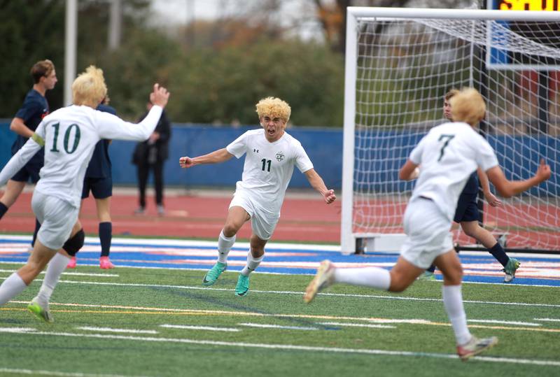Crystal Lake South’s Nico Velasco (center) celebrates his goal in the first half during the Class 2A state semifinal match against Rochester at Hoffman Estates High School on Friday, Nov. 3, 2023.
