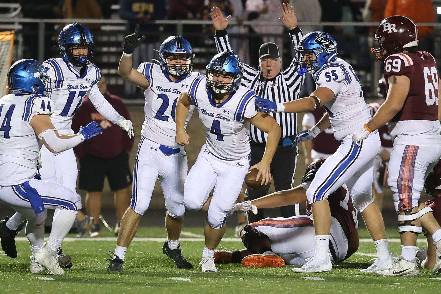 St. Charles North's Wyatt Brandt celebrates a fumble recovery against Brother Rice in the third round of the playoffs on Saturday, Nov. 15, 2025 in Chicago.