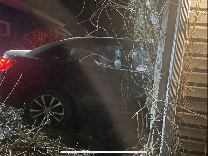 A vehicle crashed into the Crystal Lake home of Danielle Irwin on Monday, March 20, 2023, causing damage to her garage, car and belongings.