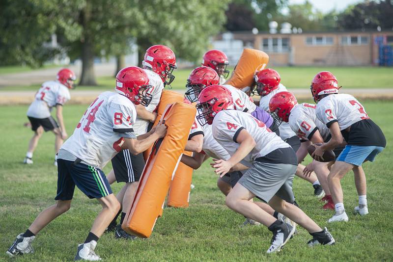 Amboy players run through drills Thursday, July 28, 2022 at the high school. First day of IHSA football practice is just over a week away for local teams.