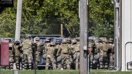 Texas National Guard troops now protecting federal property in Chicago area, official says