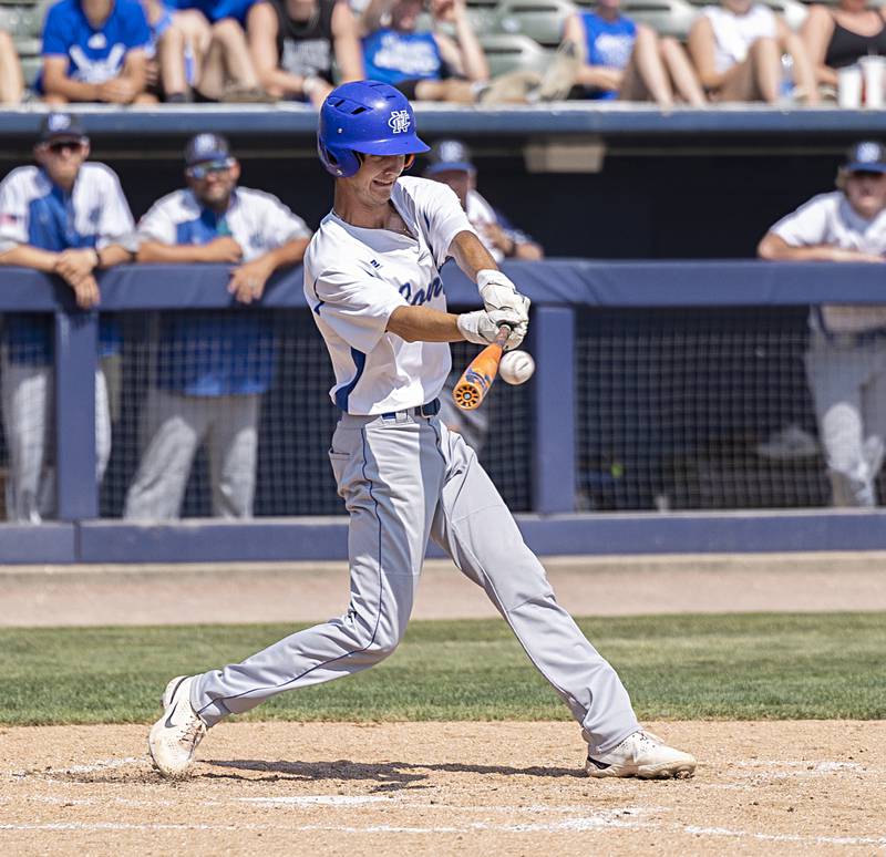 Newman’s Kyle Wolfe drives the ball to break the tie against Goreville Saturday, June 3, 2023 during the IHSA class 1A third place baseball game.