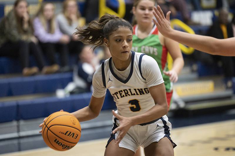 Sterling’s Delali Amankwa works against LaSalle-Peru Tuesday, Dec. 3, 2024, at Sterling High School.